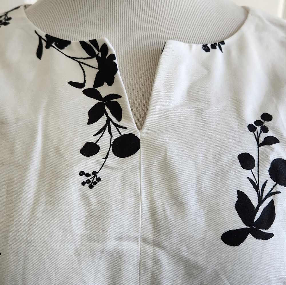 Ann Taylor classic sheath dress.   White with black flowers.  Size 8P.  NWT